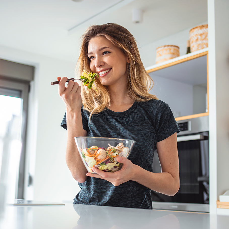 Woman eating a salad