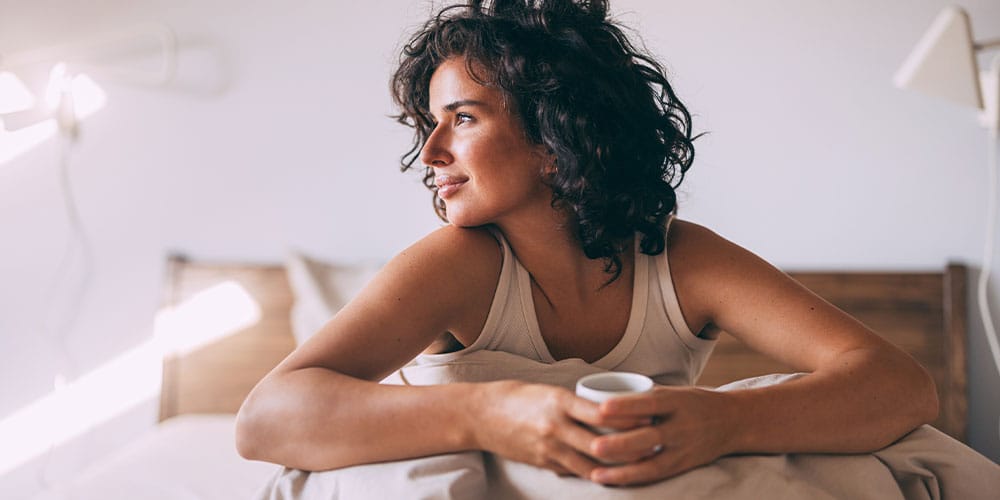 woman in the morning after starting female hormone therapy